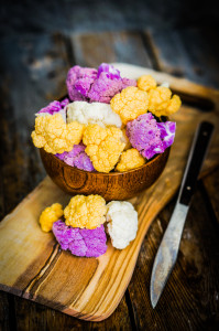 Colorful cauliflower on rustic background
